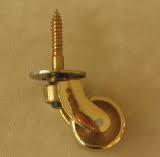 Screw plate brass castors. Set of four.